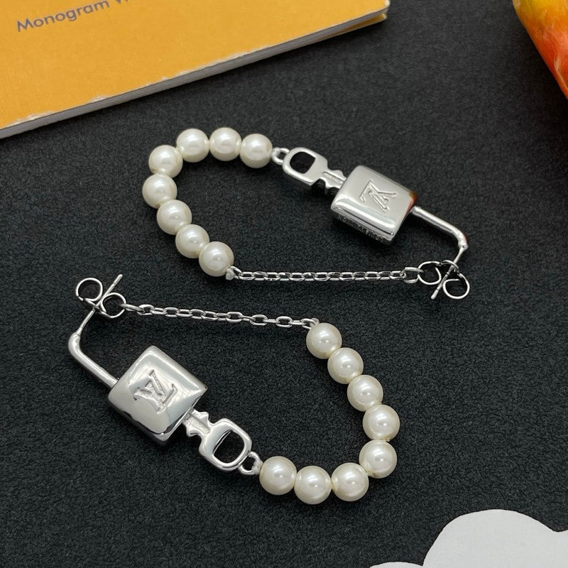 18K Louis Vuitton Pearl Lock Gold Earrings